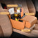 Car Center Console Armrest Pillow, Memory Foam Leather 4 in 1 Vehicle Arm Rest Cover with Tissue Box 2 Side Storage Bag Cup & Phone Holder, Auto Armrest Cushion, Universal Fit (Orange)