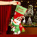 Christmas stockings with hanging loops, perfect for decorating the mantelpiece; they can be used to hold candies and small gifts, suitable for both children and adults.